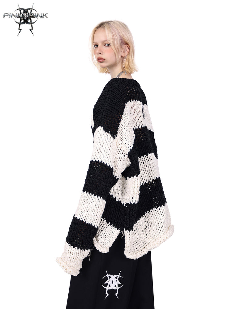 PINKSPINK MIRROR striped open-knit padded-shoulder sweater in black white stripes — angled rear modeled view showing the open-knit texture