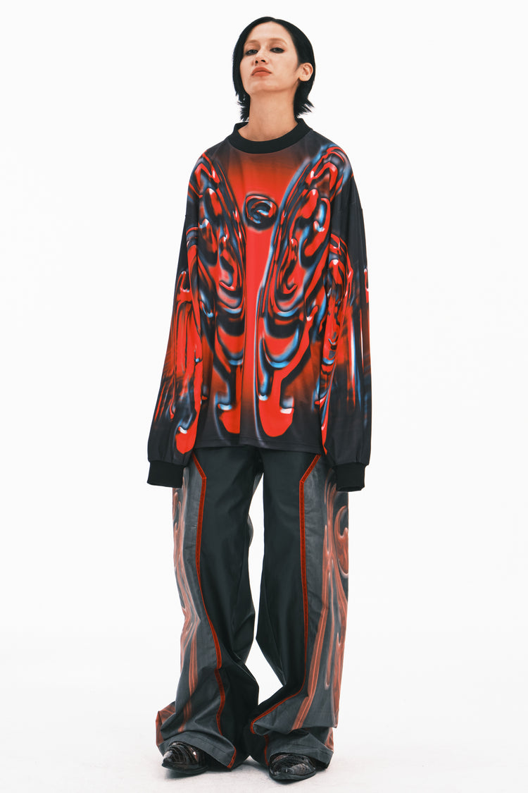 EMBRYO RED TOTEM coated wide-leg pants — close modeled view