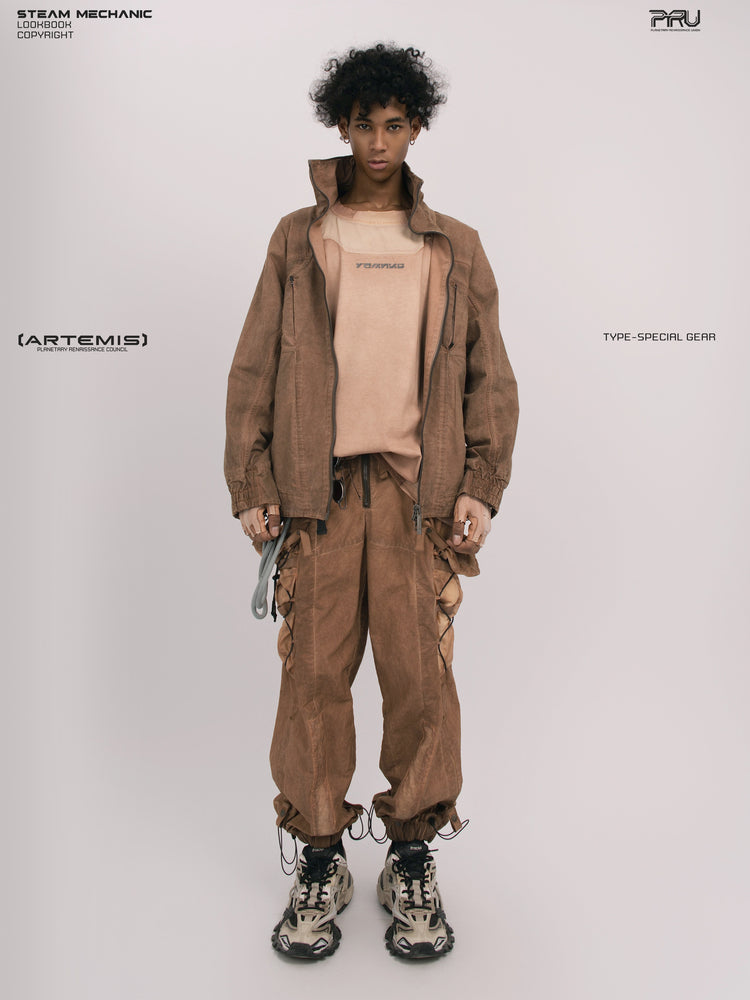ARTEMIS soft dawn orange tuck-paneled technical jacket — full-length front modeled view with jacket open