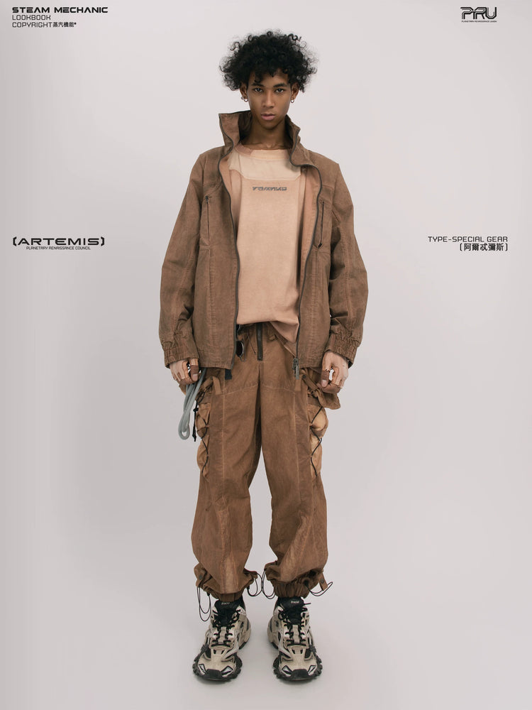 ARTEMIS soft dawn orange tuck-paneled technical jacket — front modeled product view