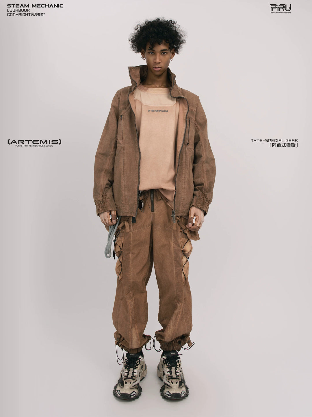 ARTEMIS soft dawn orange tuck-paneled technical jacket — front modeled product view