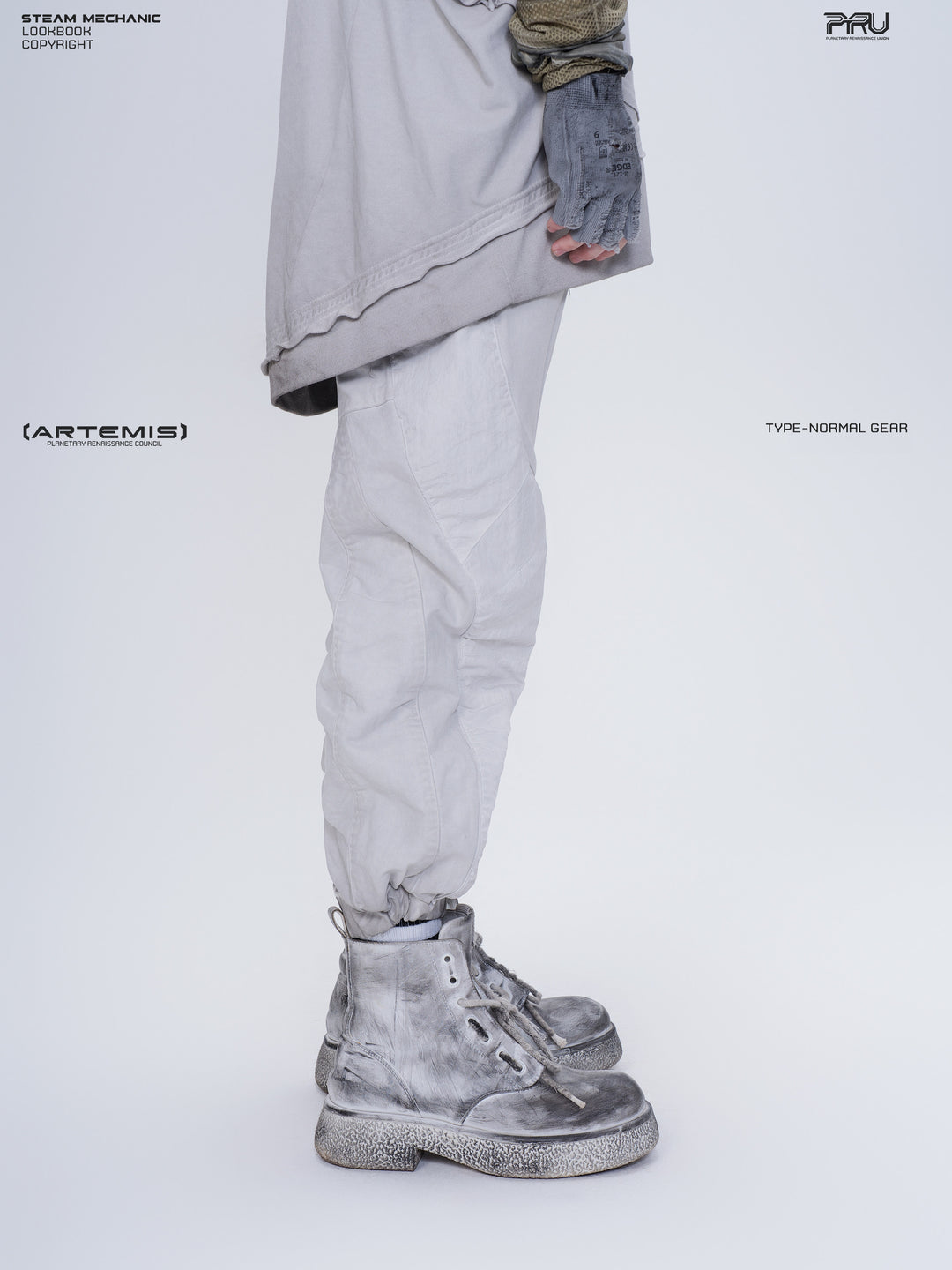 AEGIS eris white cropped moto riding pants — opposite side close-up showing the shaped leg panels and gathered cuff