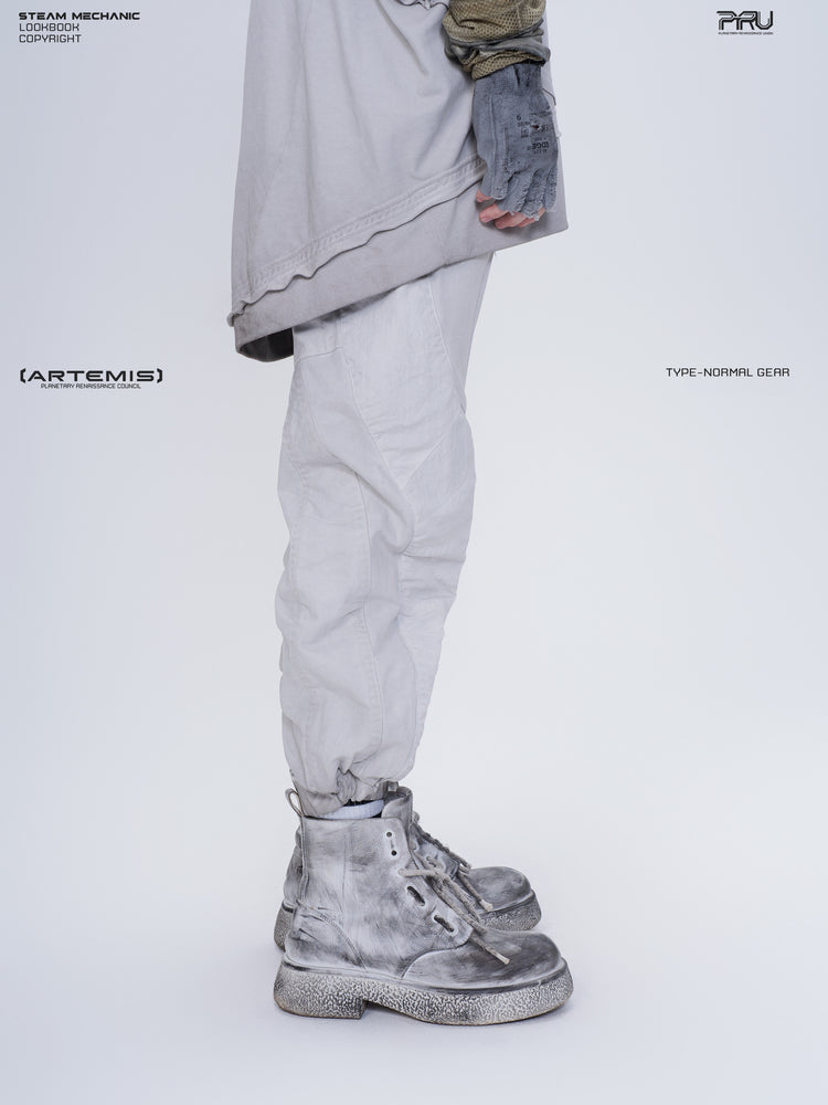AEGIS eris white cropped moto riding pants — opposite side close-up showing the shaped leg panels and gathered cuff