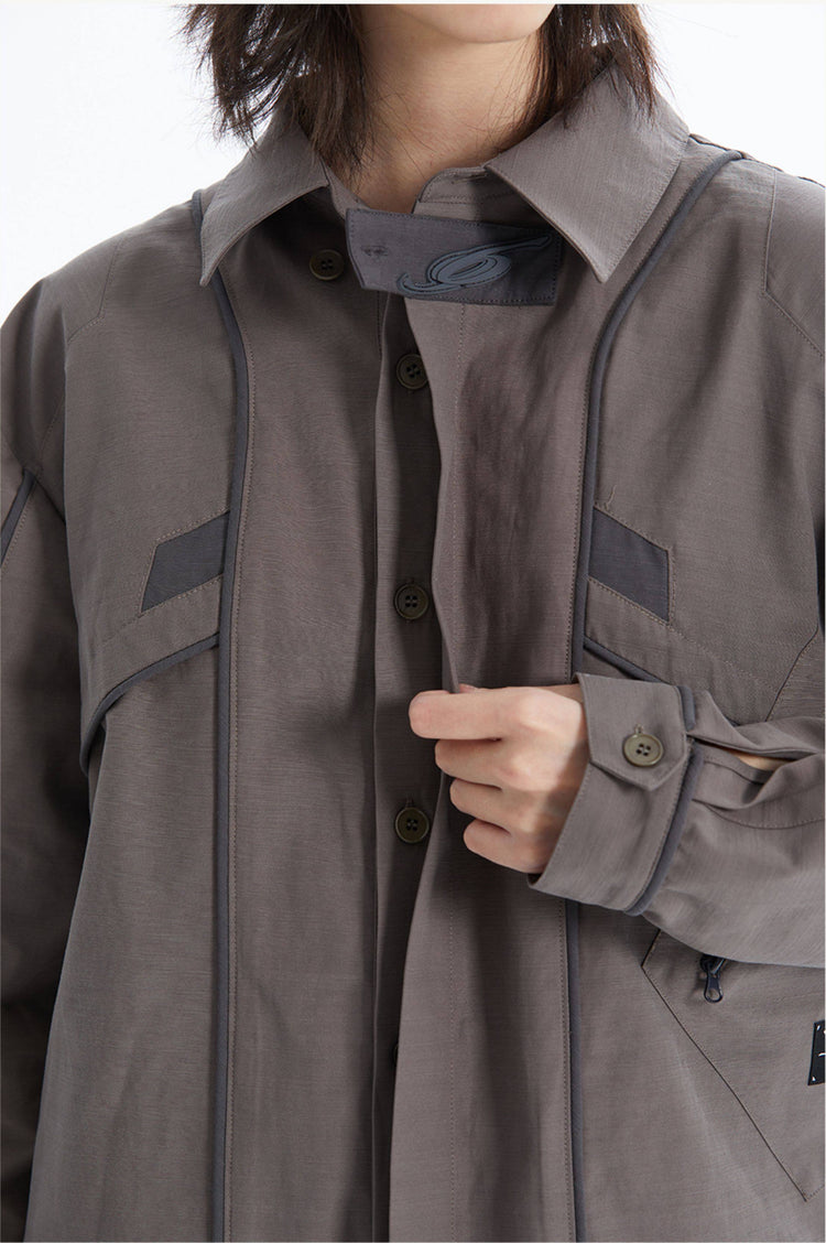 ERRORCODE ROBOT taupe tech work shirt — collar, button placket and cuff close-up
