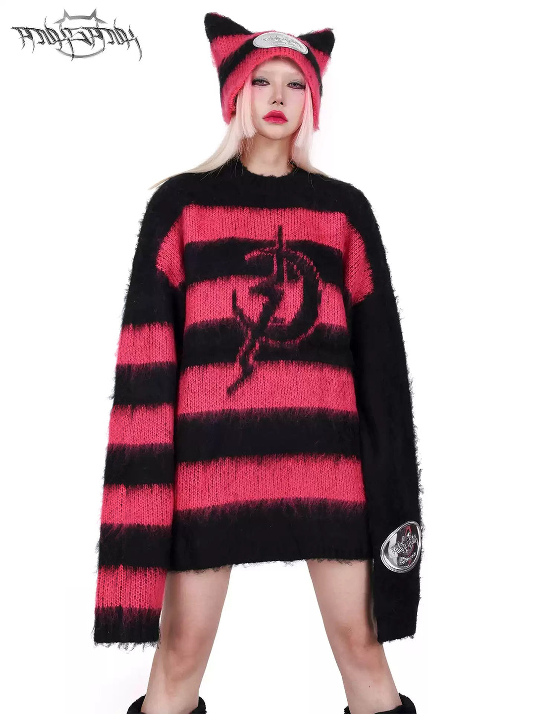 PINKSPINK ELECTRIC MOON black-pink striped sweater in black pink — front modeled close-up showing the electric-moon motif and striped knit