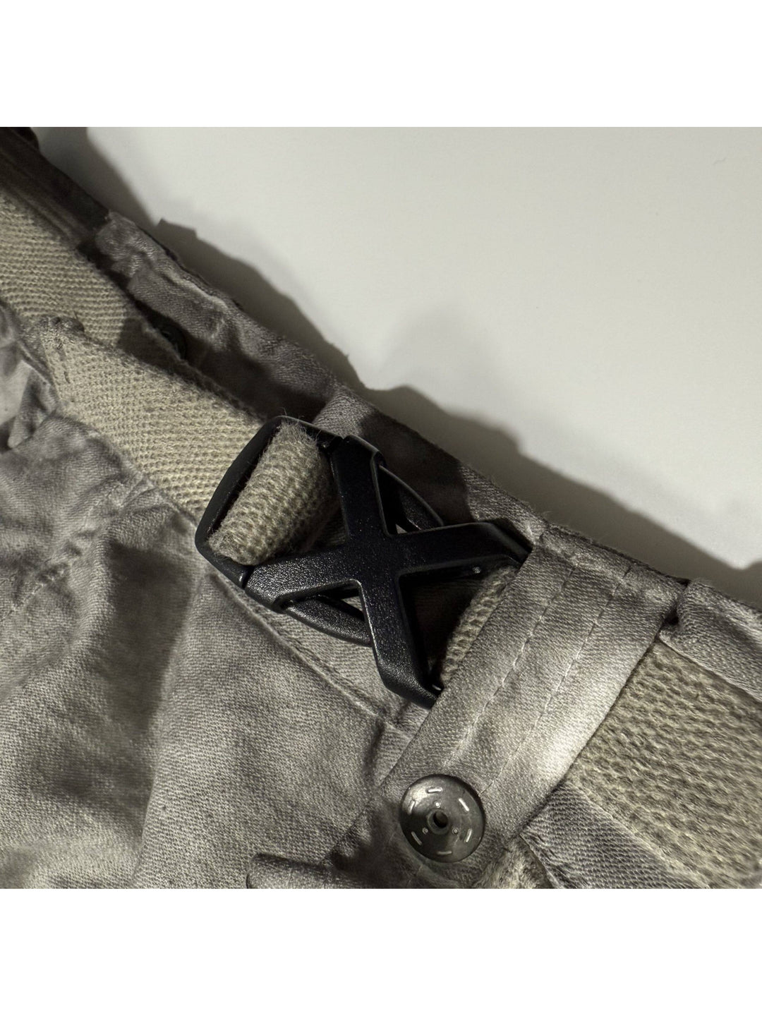 PIONEER meteor gray knee-mesh utility work pants — adjustable waist webbing and buckle close-up