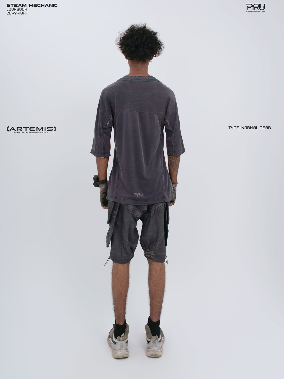 LIGHTSHADOW spirit deconstructed technical tee — full-length straight back view showing the curved hem and panel seams