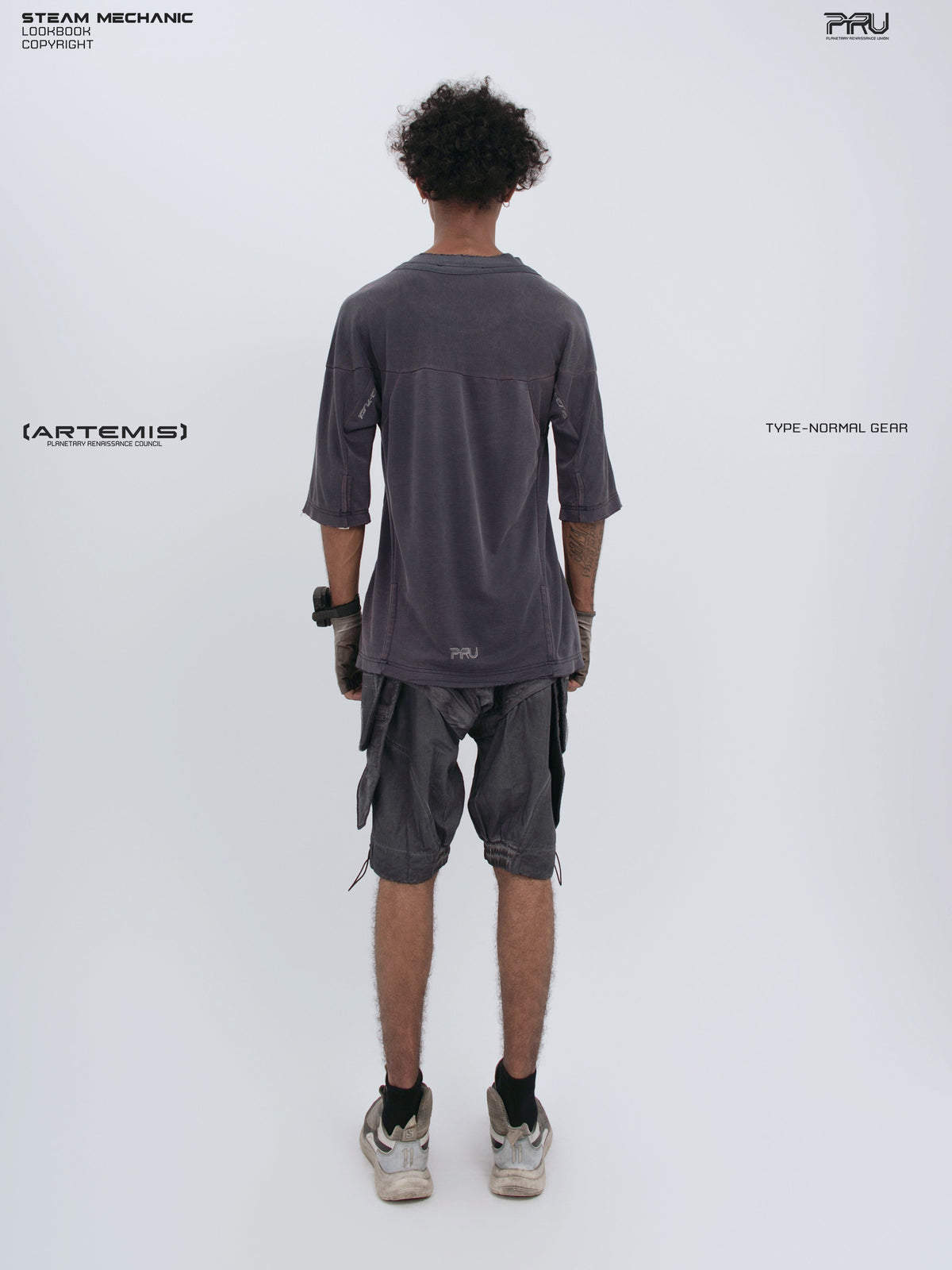 LIGHTSHADOW spirit deconstructed technical tee — full-length straight back view showing the curved hem and panel seams