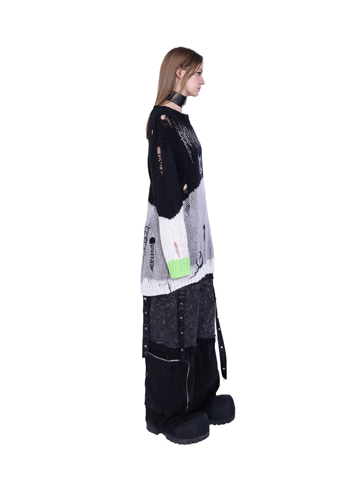 PINKSPINK SPHYNX distressed striped graphic sweater — black-green graphic sweater — side view showing plain sleeve