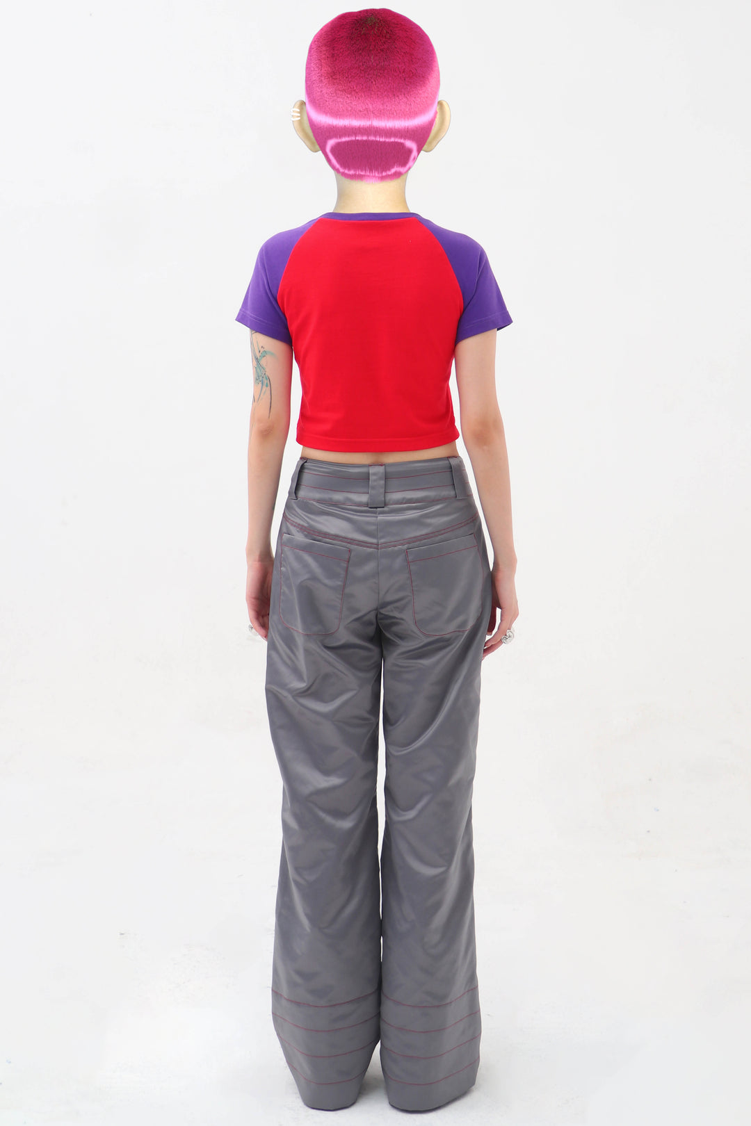 EMBRYO STARSHIFT ruched 3D-effect pants — close modeled view
