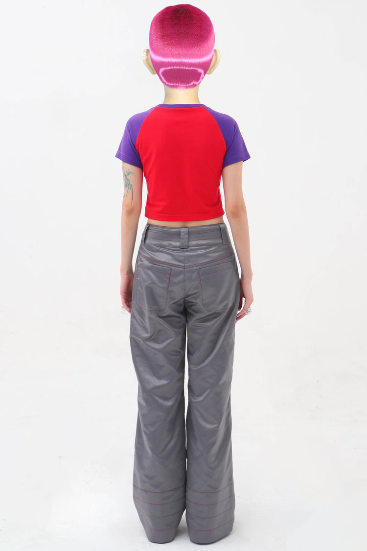 EMBRYO STARSHIFT ruched 3D-effect pants — close modeled view