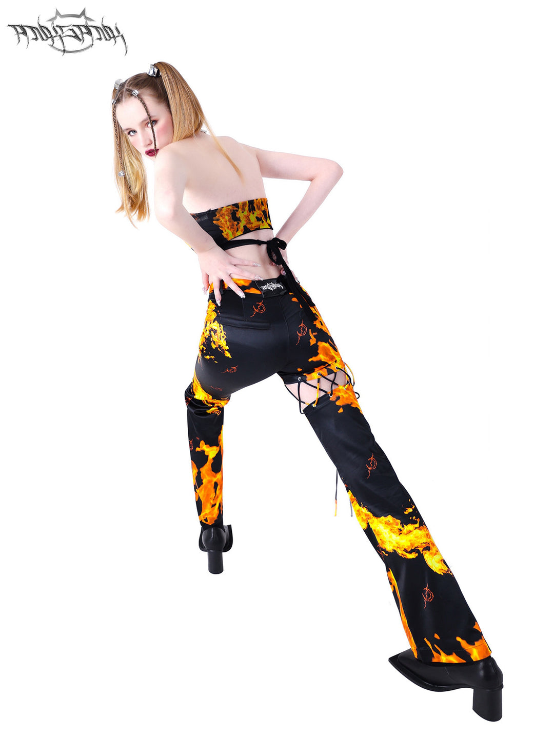PINKSPINK ELECTRIC MOON cutout detachable flare pants — modeled detail view of the garment construction