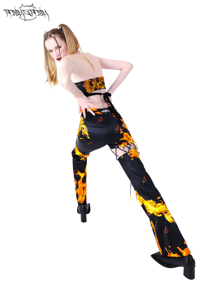 PINKSPINK ELECTRIC MOON cutout detachable flare pants — modeled detail view of the garment construction