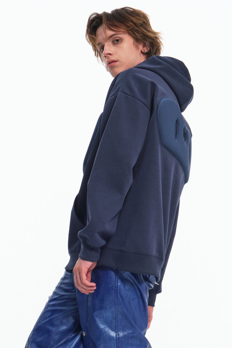 EMBRYO IMPACT SHIELD padded hoodie — material and hardware detail