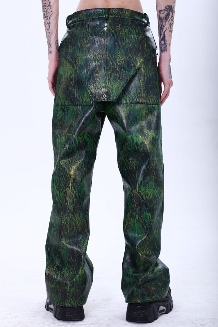 EMBRYO TRIANGLE ARMOR lace-inset leather pants in green — full-length back modeled view showing the triangular overlay and rear pockets