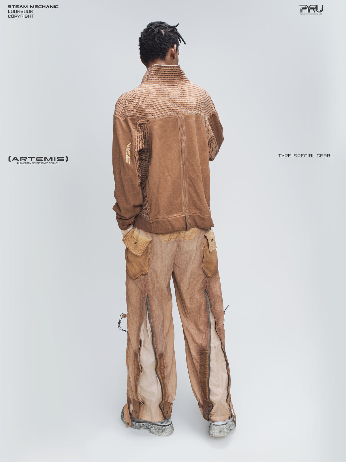 STARCORE venus orange engineer utility pants — full-length rear modeled view showing the contrast leg panels and utility pockets