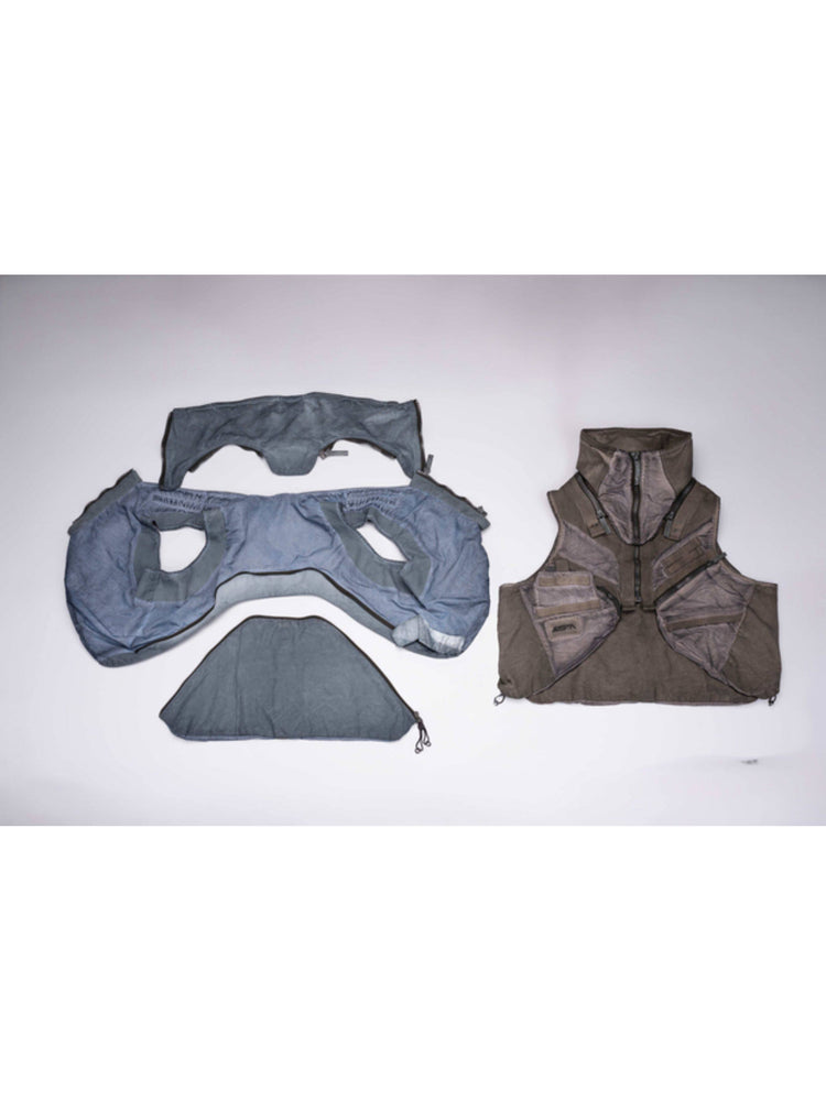 FISSION modular vest — front flat-lay comparison of star blue detached panels and the assembled mercury brown vest