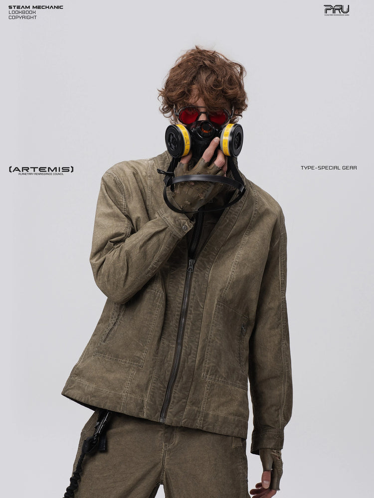 GAIA gravel brown open-collar technical robe — angled front modeled view with a respirator held to the face