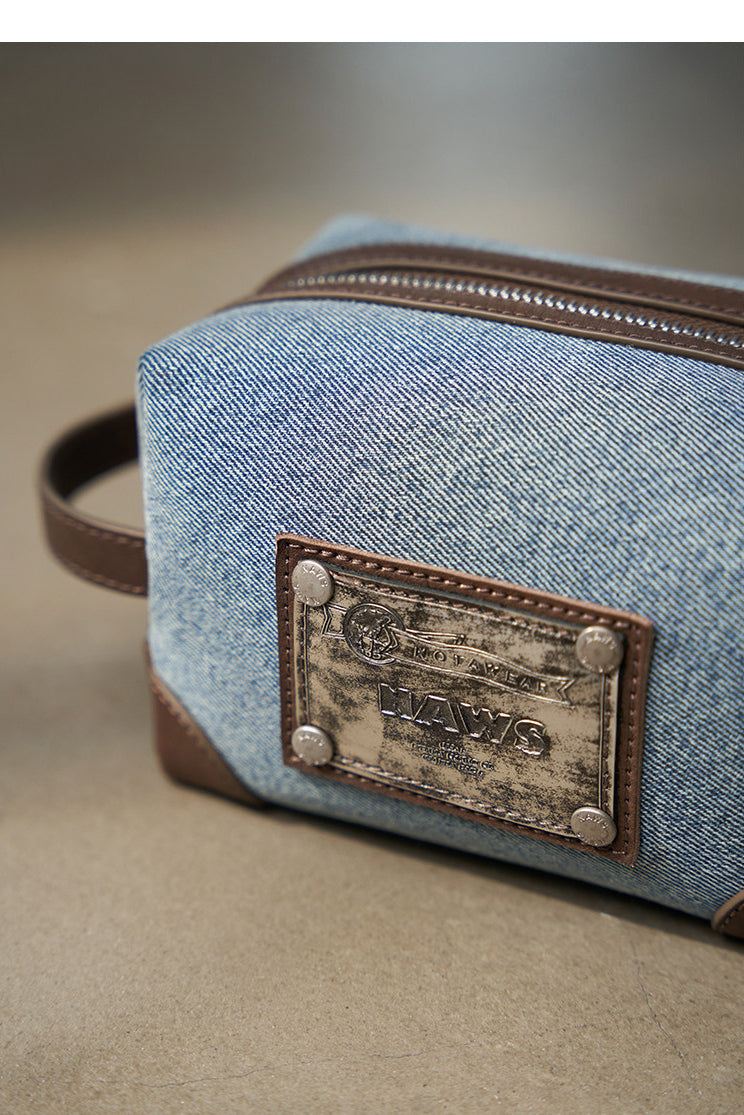 NAWS BLUE BOX denim makeup bag — full-length modeled styling view