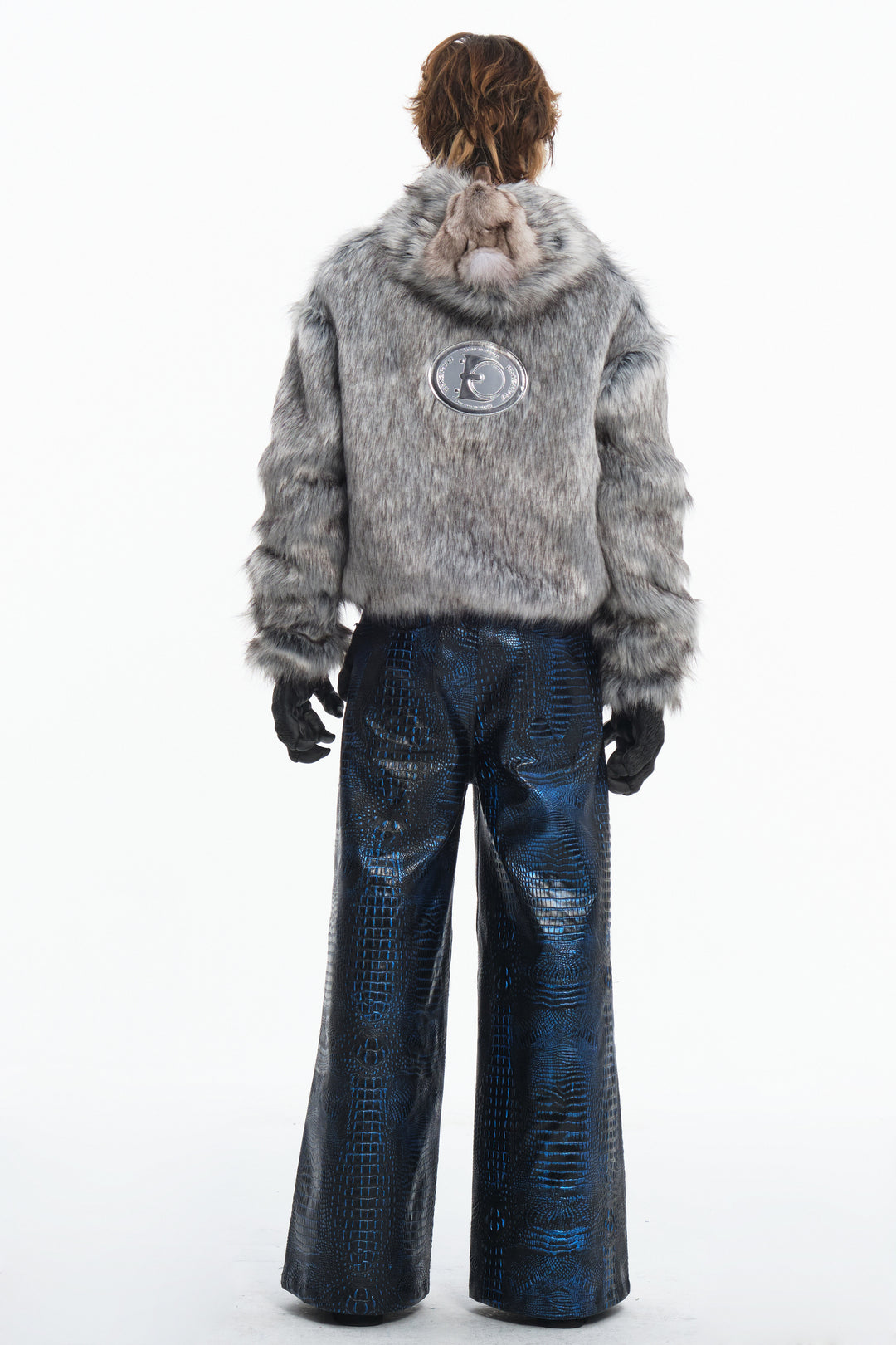 EMBRYO CLAW ARMOR crocodile-effect wide-leg pants — close modeled styling view
