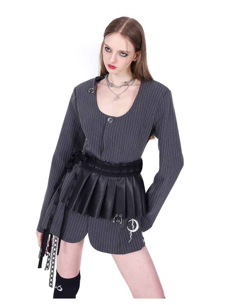 PINKSPINK ELECTRIC MOON pinstripe ring-detail blazer dress in gray pinstripe — close angled front modeled view showing the crescent embroidery