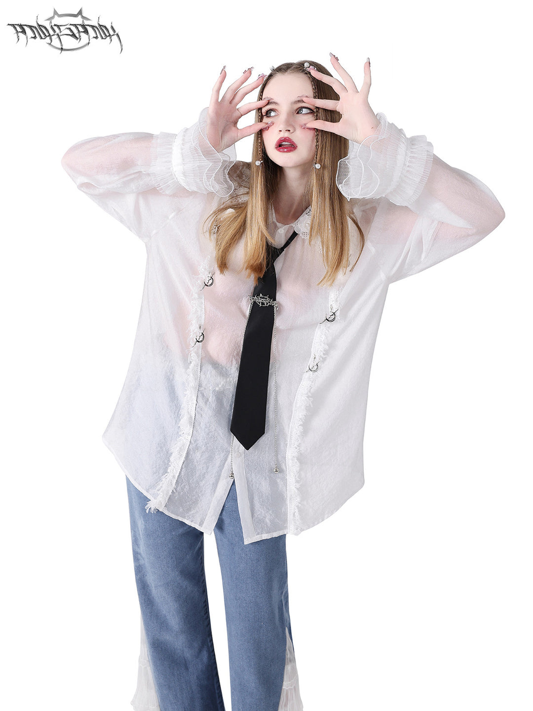 PINKSPINK FAIRY lace-trim sheer blouse — front modeled view with hands raised beside the face