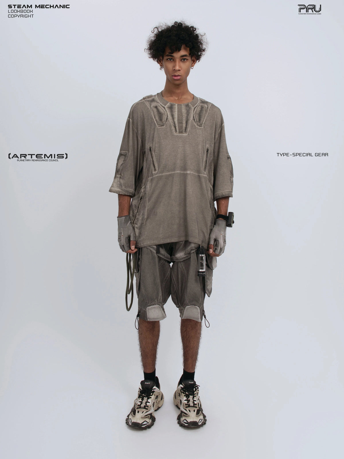 STARCORE xirang brown distressed mesh tee — full-length front view with both hands down