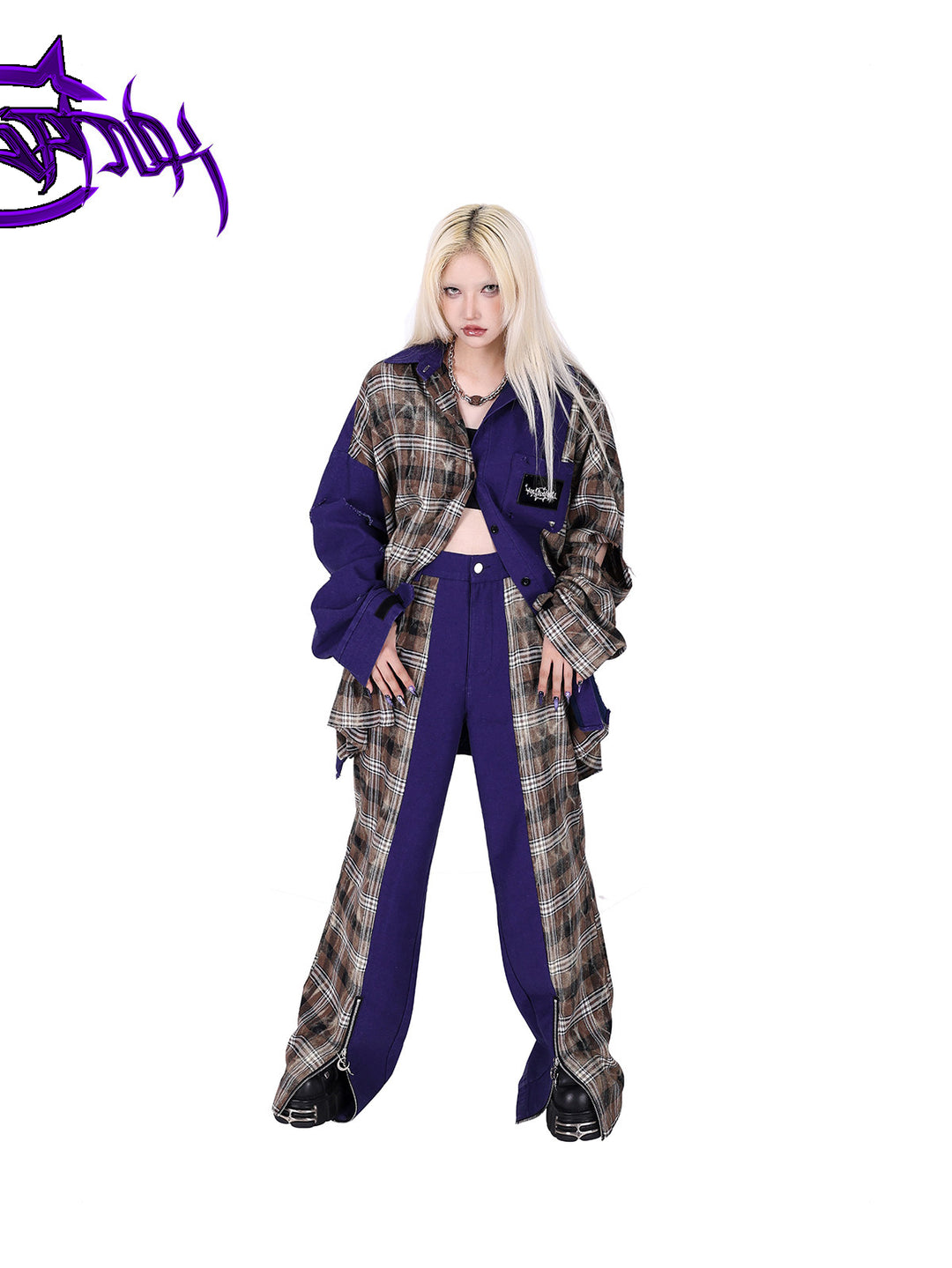 PINKSPINK DNA purple plaid split-panel wide-leg pants — front modeled view showing the split-panel construction