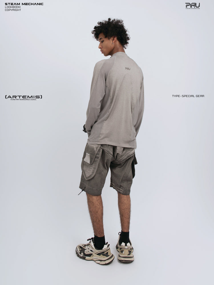 STARCORE mesh-panel long-sleeve top — full-length opposite rear three-quarter view