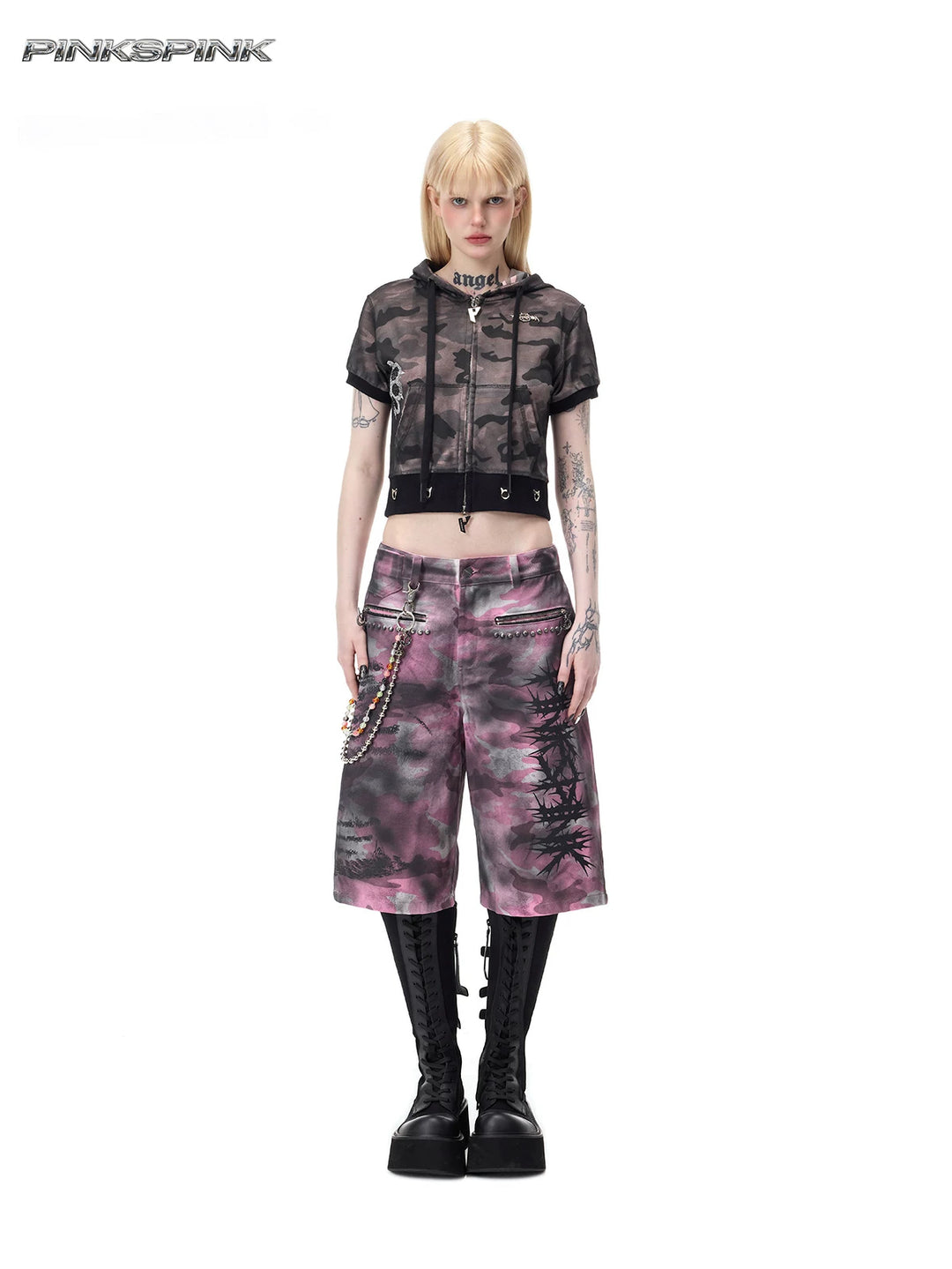 PINKSPINK ELECTRIC MOON coated camouflage denim shorts in pink-gray camouflage — full front modeled view with wide legs and studded zip pockets