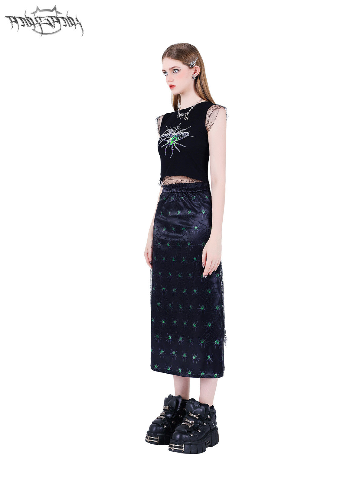 PINKSPINK SPIDER layered web-mesh midi skirt — side full-length modeled view styled with a cropped top