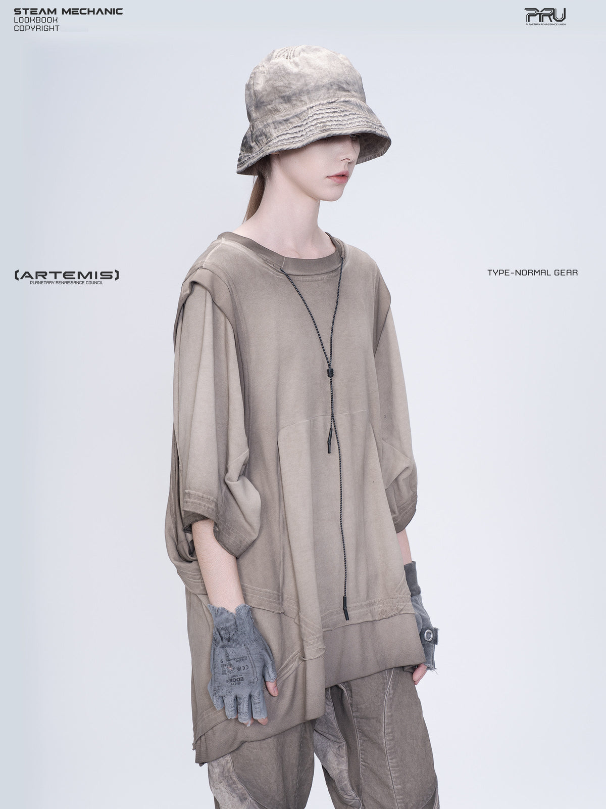 PIONEER mercury brown distressed nylon bucket hat — three-quarter modeled view showing the crown shape