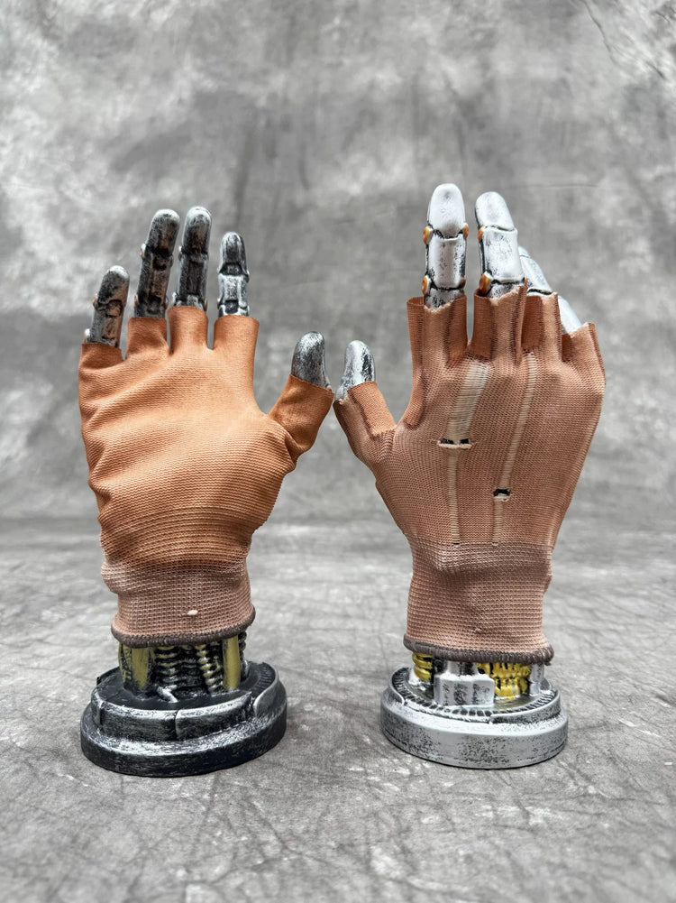 PRECISION CASTING distressed fingerless gloves in soft orange — distressed fingerless gloves on upright metal display hands