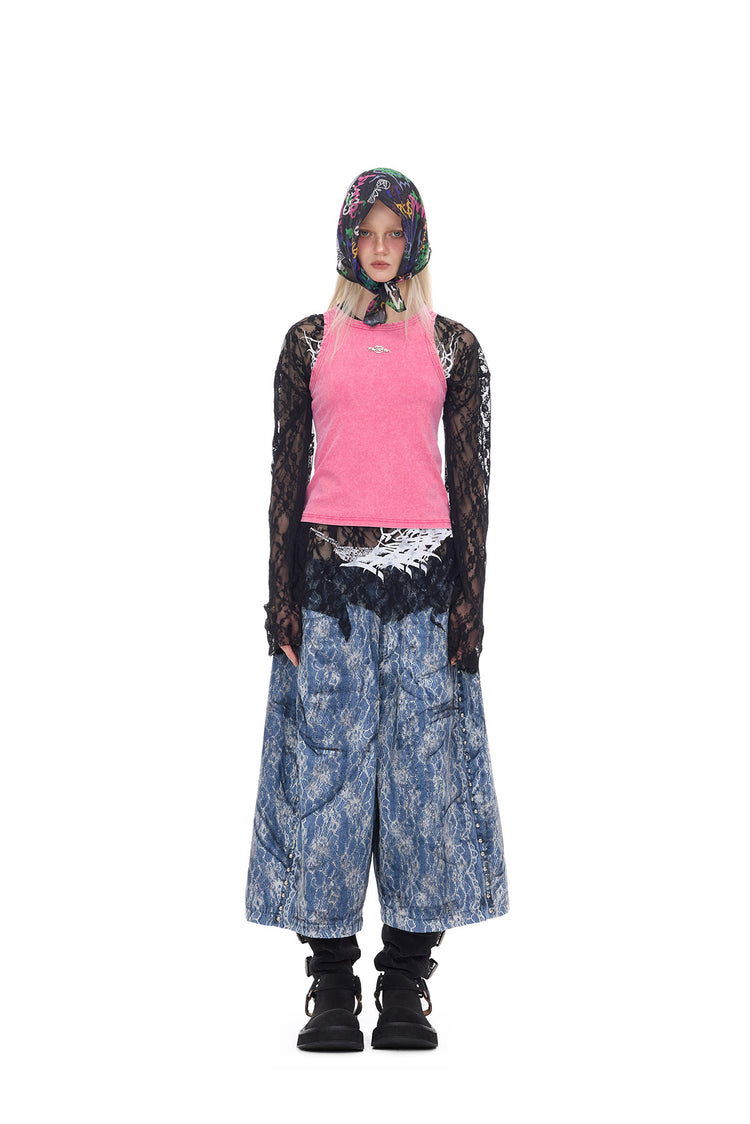 PINKSPINK ELECTRIC MOON lace-coated wide-leg denim shorts in blue — full-length front modeled view with a pink top and black lace layers