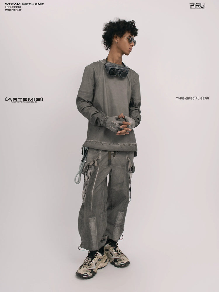 CHAOS ERA moon dust gray raw-edge long-sleeve top — full-length front view looking to the side