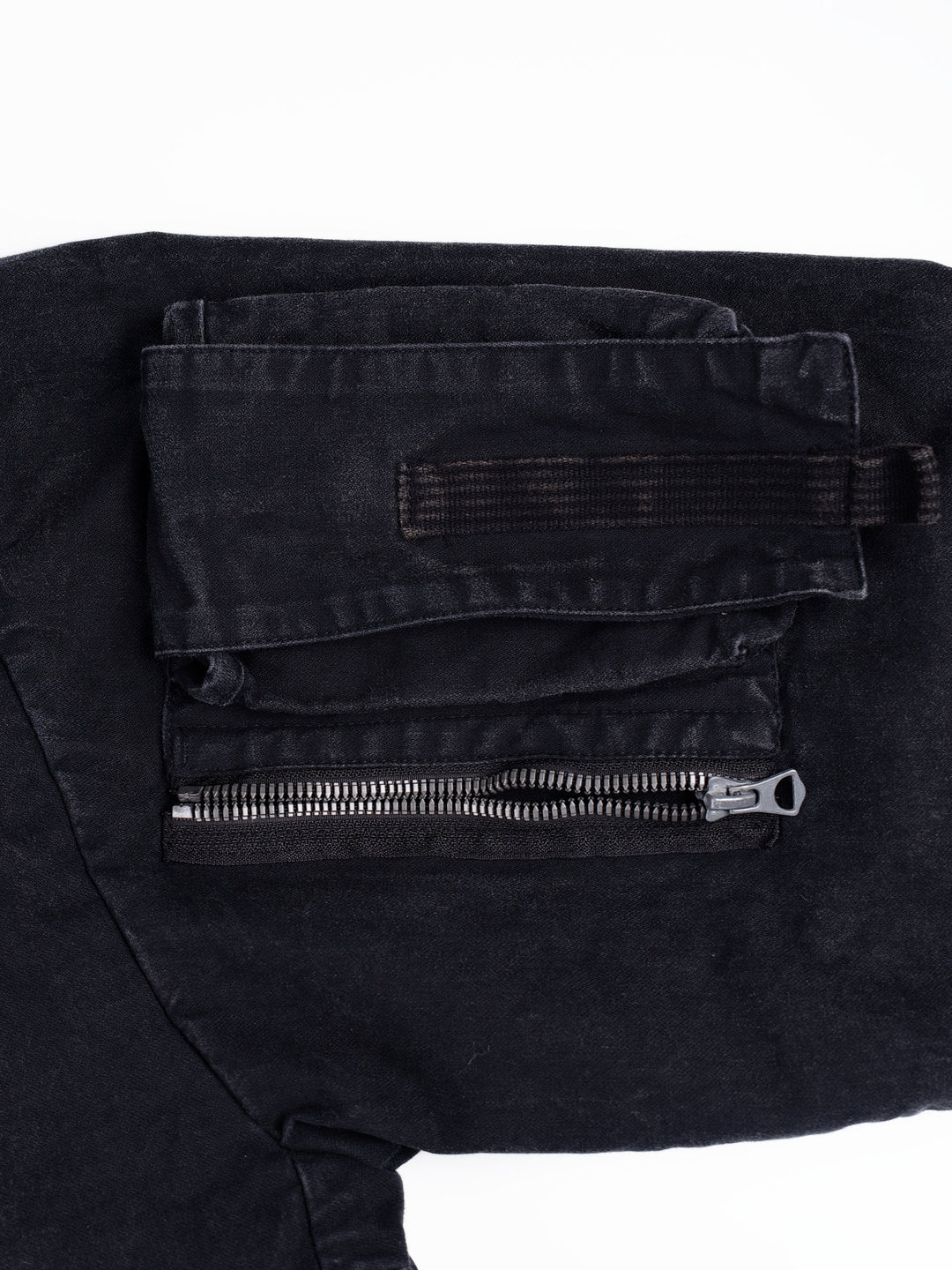 GAIA night black priest zip robe jacket — sleeve utility pocket with flap, webbing and zip compartment close-up