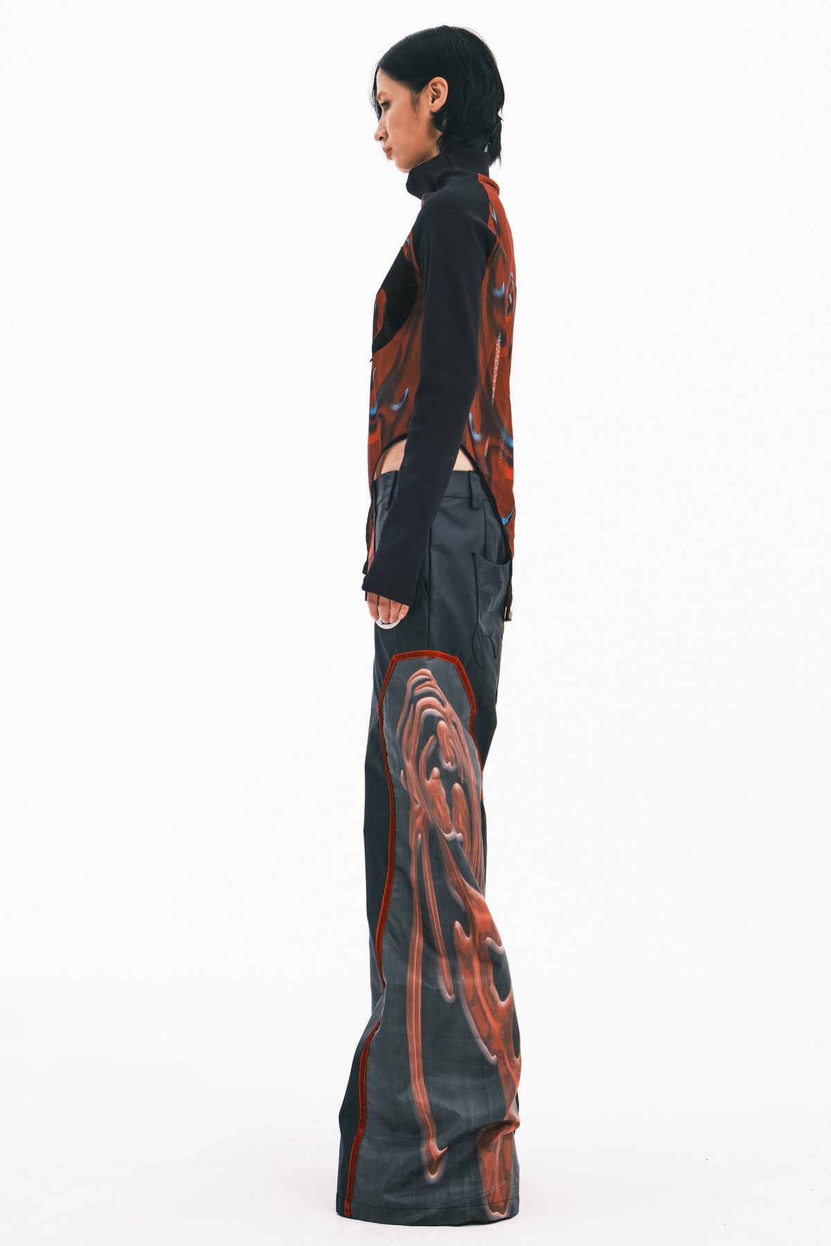 EMBRYO RED TOTEM coated wide-leg pants — rear modeled view