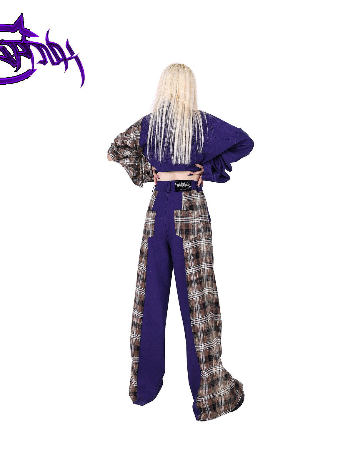PINKSPINK DNA purple plaid split-panel wide-leg pants — back modeled view with waistband and patch pockets exposed