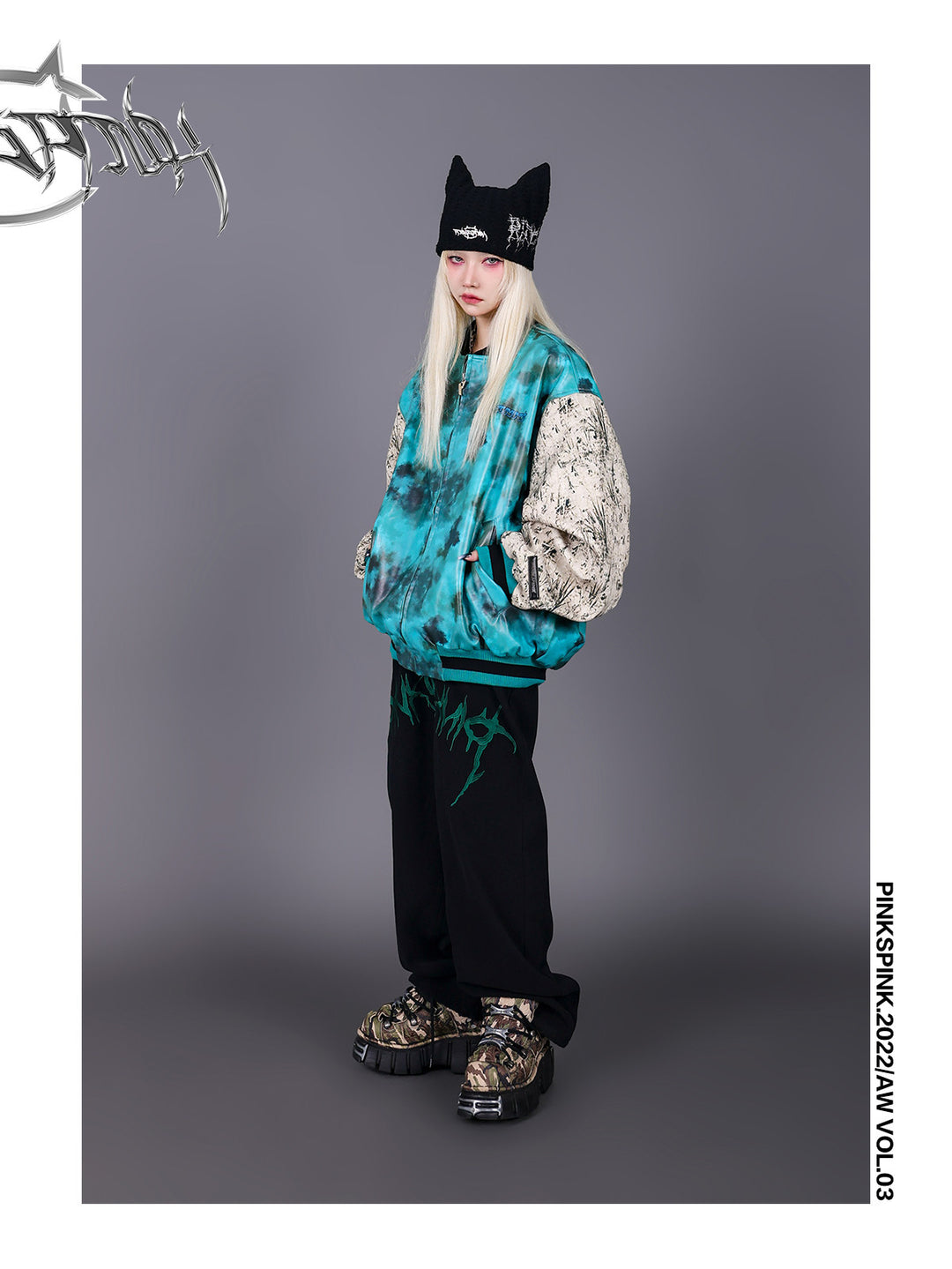PINKSPINK SPHYNX thorn-embroidered cat-ear beanie — modeled detail view of the garment construction