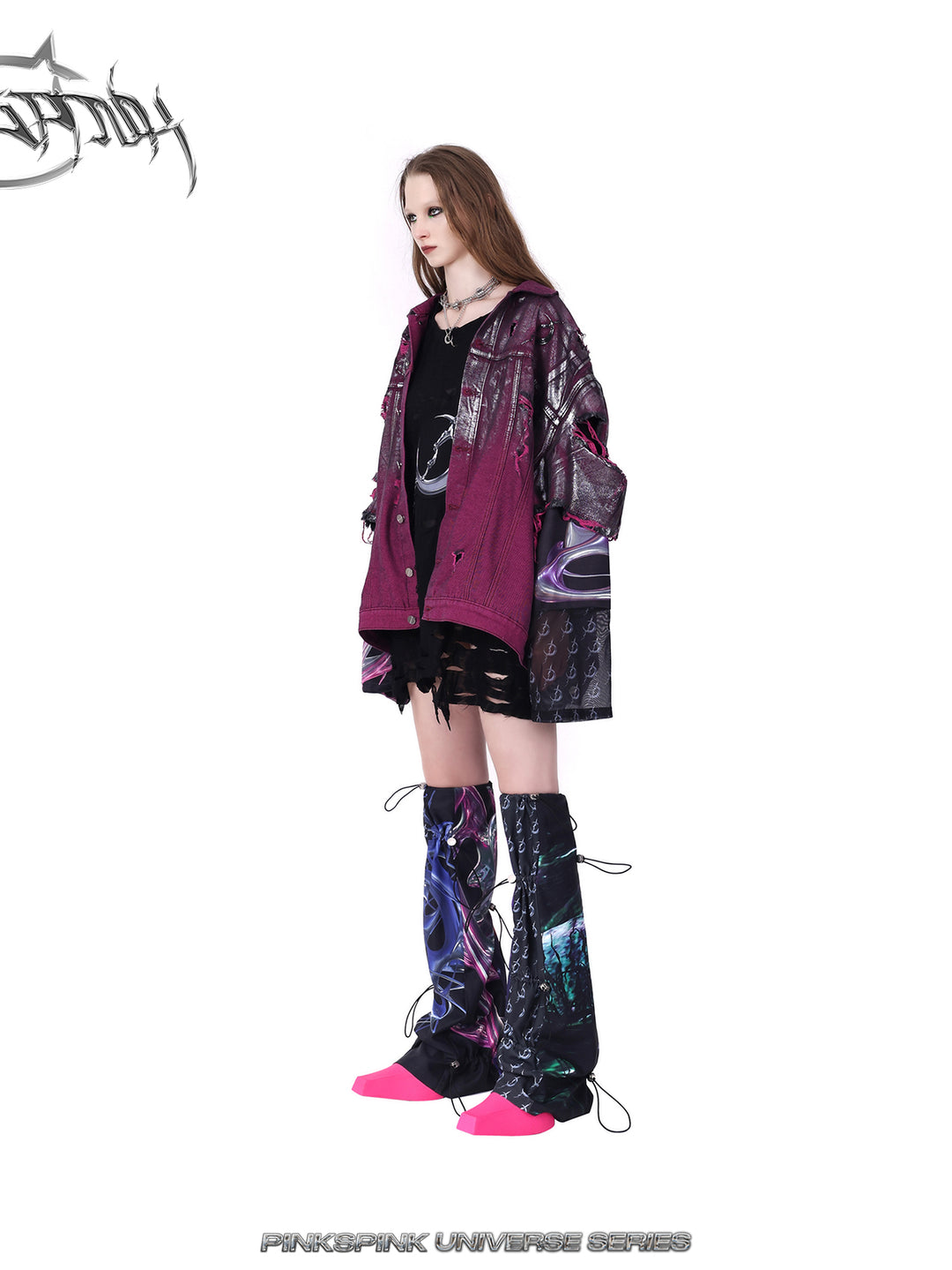 PINKSPINK silver-coated distressed denim jacket in WASTELAND PINK — opposite side view styled with shorts.