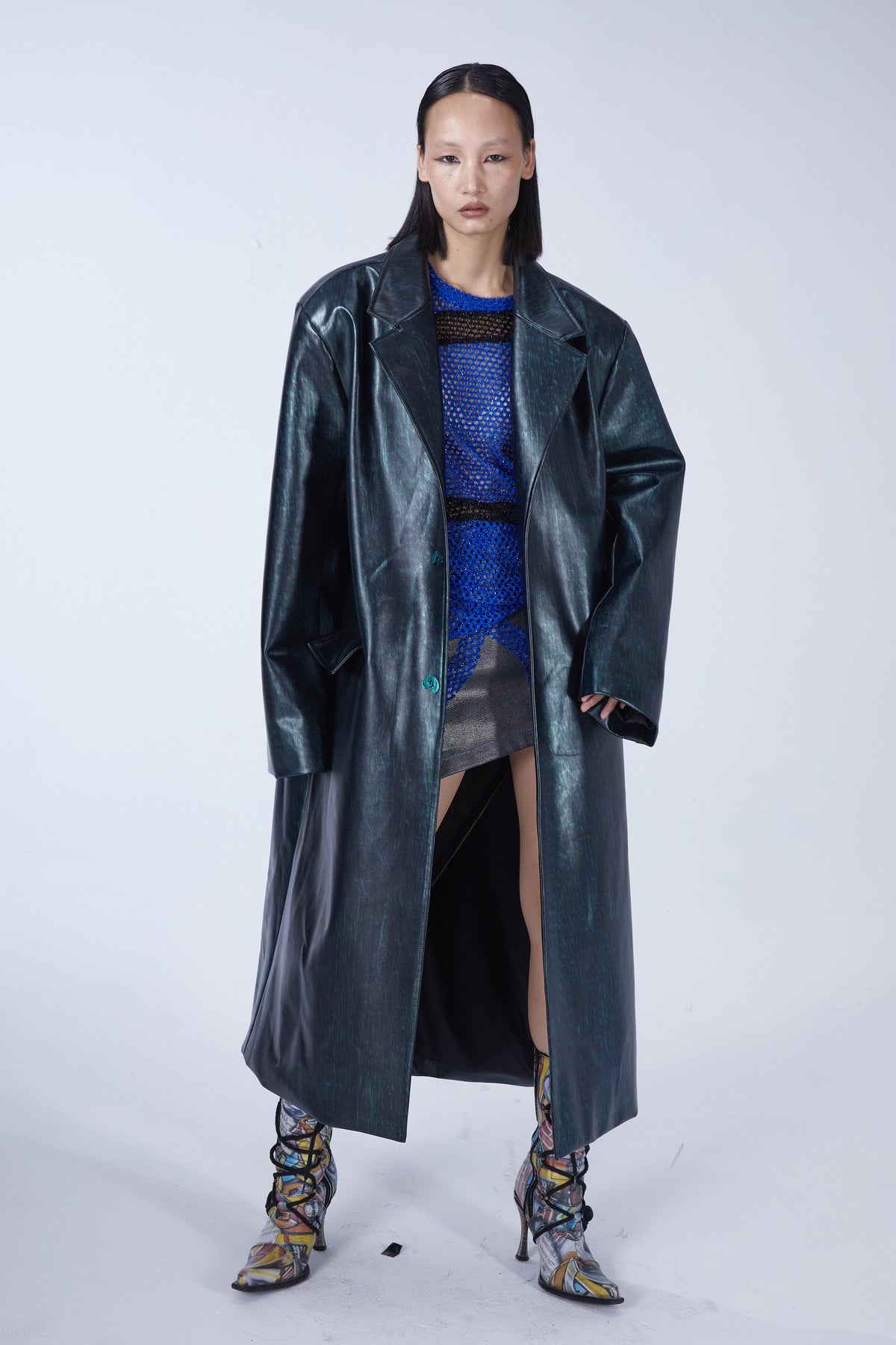 EMBRYO MATRIX buckle PU leather trench coat — rear modeled view