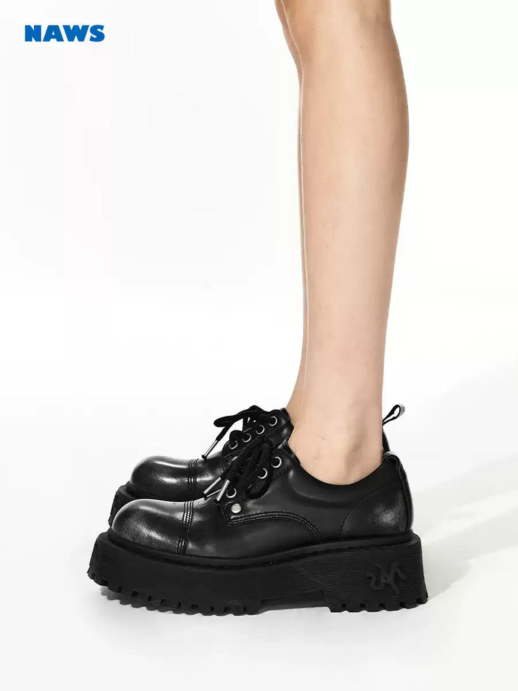 NAWS NIGHT TIDE burnished platform leather derby shoes — alternate modeled view showing the silhouette