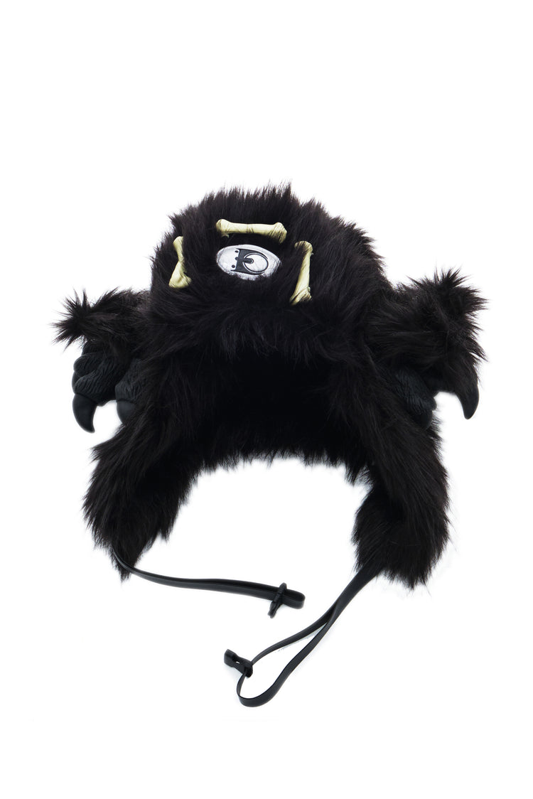 EMBRYO BLACK BEAST bone-detail faux-fur hat — full-length modeled view