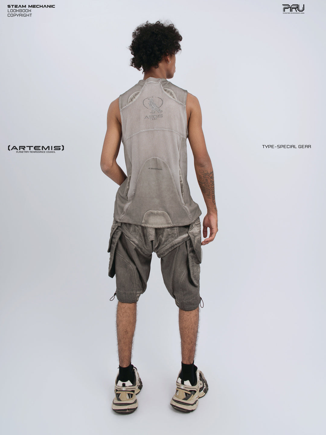 AEGIS lunar sea gray distressed mesh tank — full-length back modeled view showing the emblem and shaped mesh panel