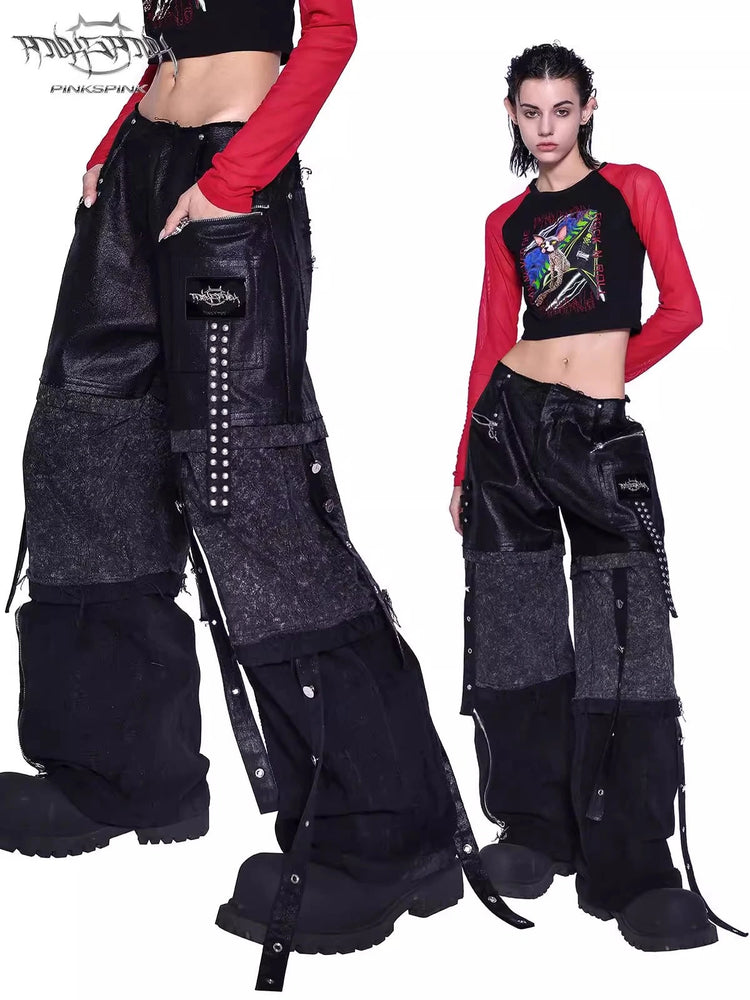 PINKSPINK RECOMBINATION stacked low-rise jeans in black — front and rear styling collage showing layered denim panels and hanging studded straps.