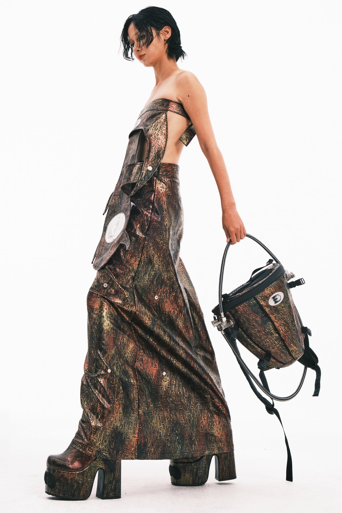 EMBRYO ORACLE embossed backpack — rear modeled view