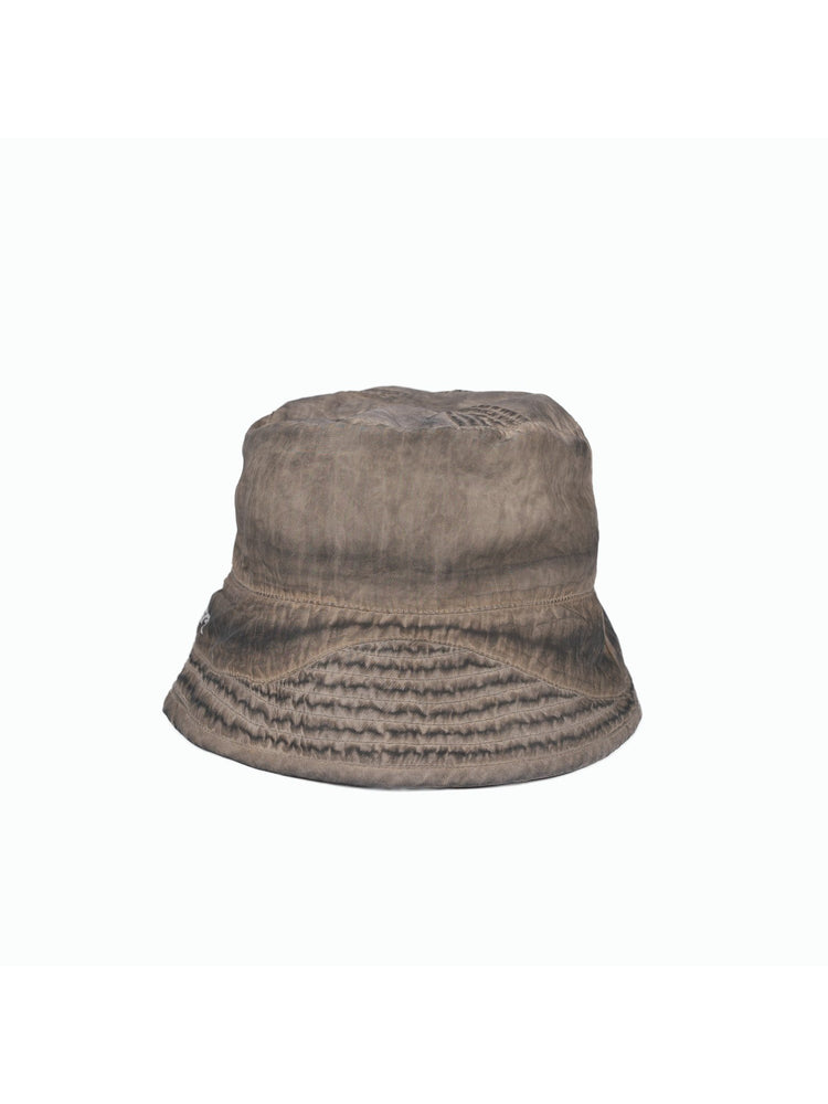 PIONEER mercury brown distressed nylon bucket hat — back garment-only view showing the washed finish and crown seams