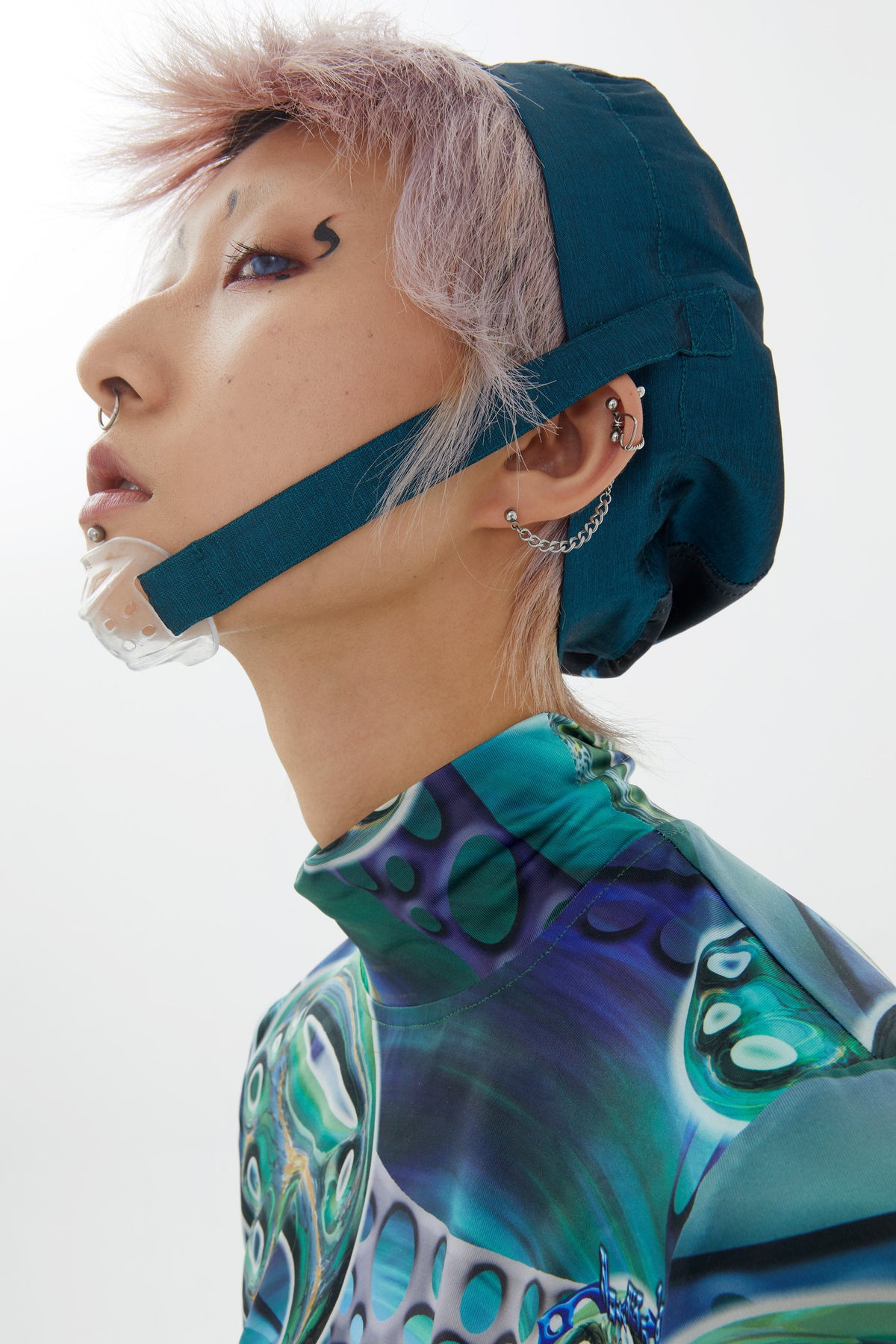 EMBRYO LARVA patchwork cycling cap — close modeled view