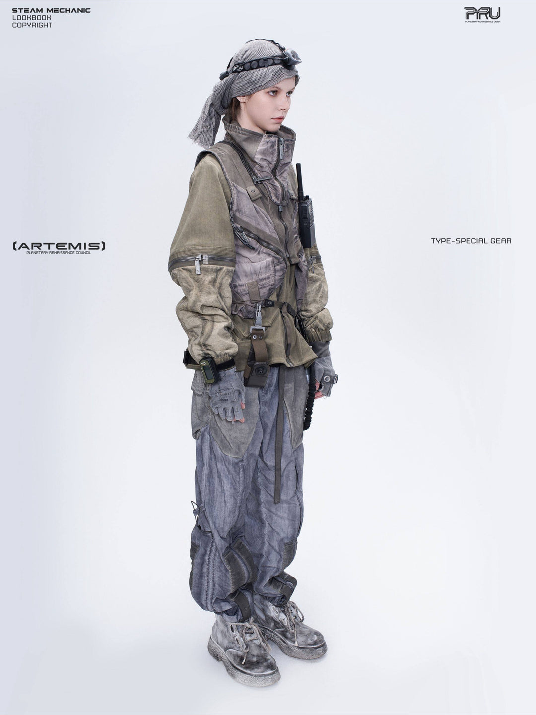 FISSION modular vest in mercury brown — full-length modeled side view on a woman