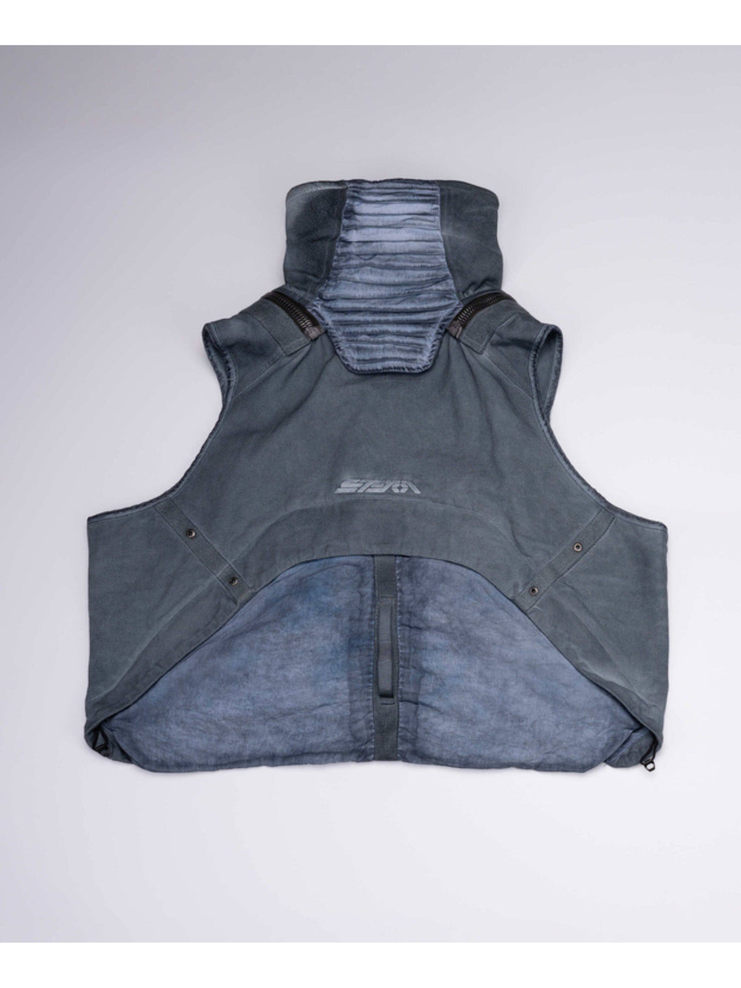 FISSION modular vest in star blue — blue back garment-only view showing removable rear pouch and pleated collar